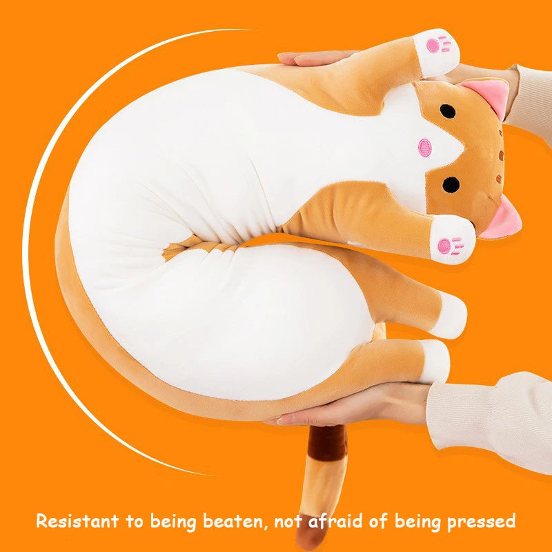 Plush cat toy pillow by a hand on an orange background with text.