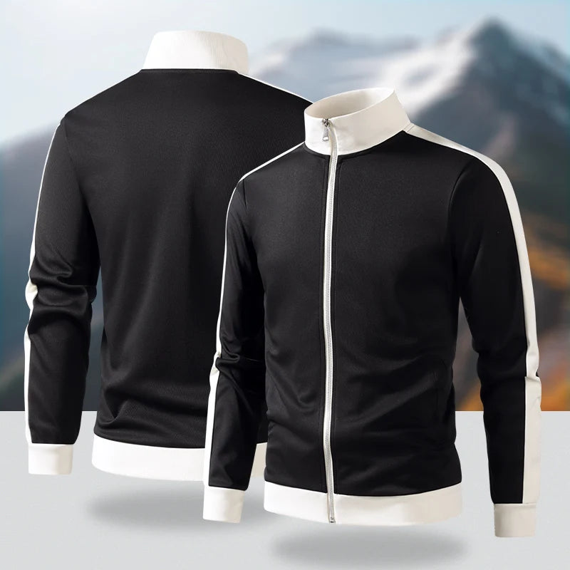 Black jacket with white accents on a mannequin against a mountainous background