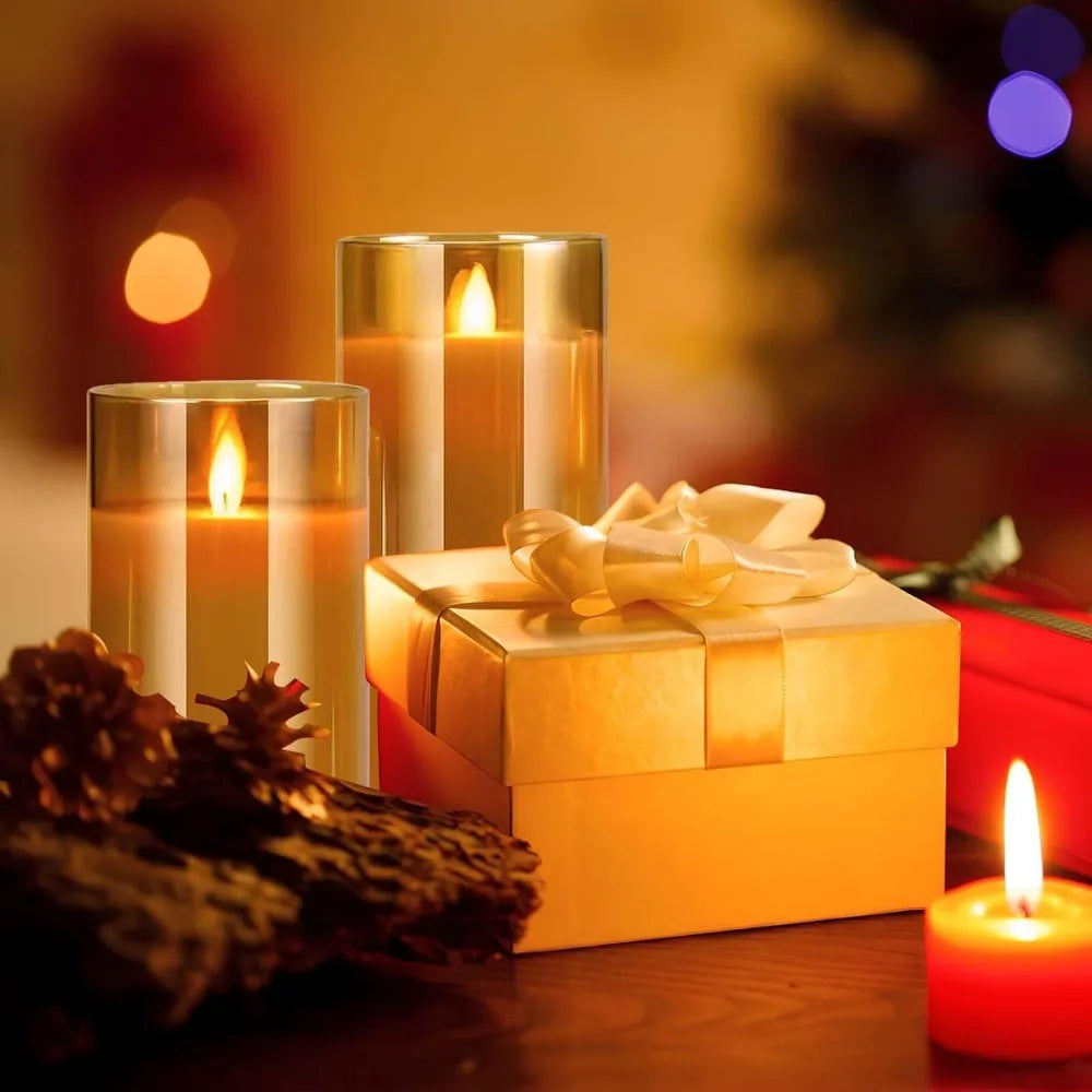 Candlelit scene with a gift box and decorative elements on a warm-toned background