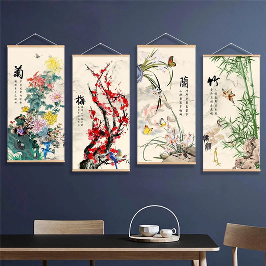 Four hanging Chinese-style scroll paintings on a dark blue wall above a wooden table.