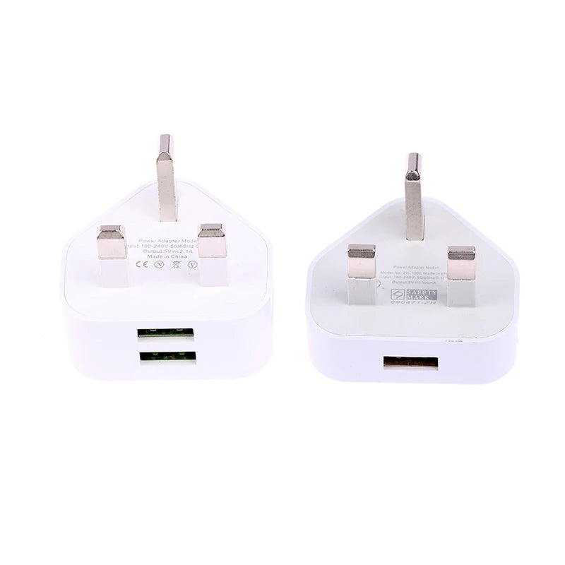 Two white USB travel adapters on a white background
