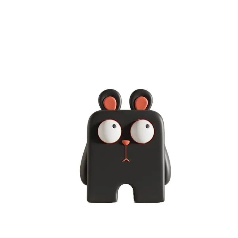 Black cartoon-like character with red ears on a white background