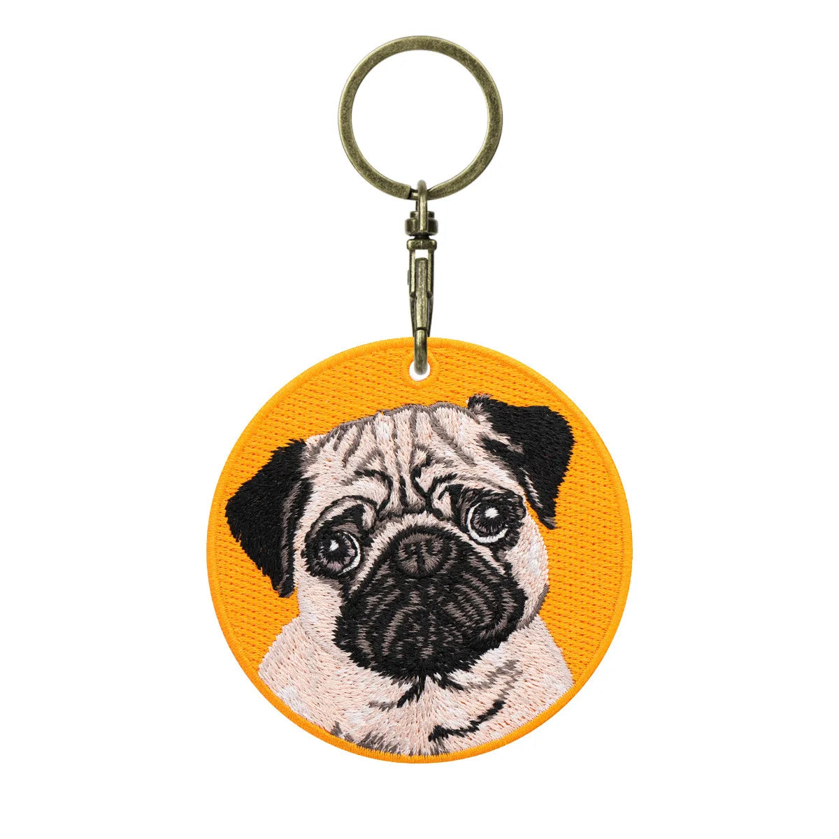 Keychain with a pug dog illustration on an orange background