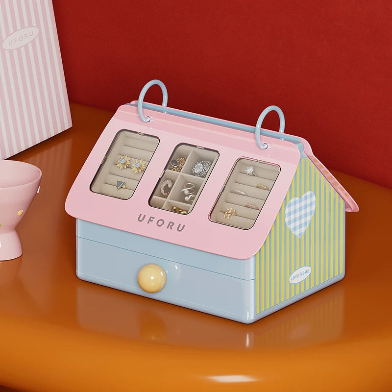Pink and blue jewelry box with 'UFORU' branding on a red background