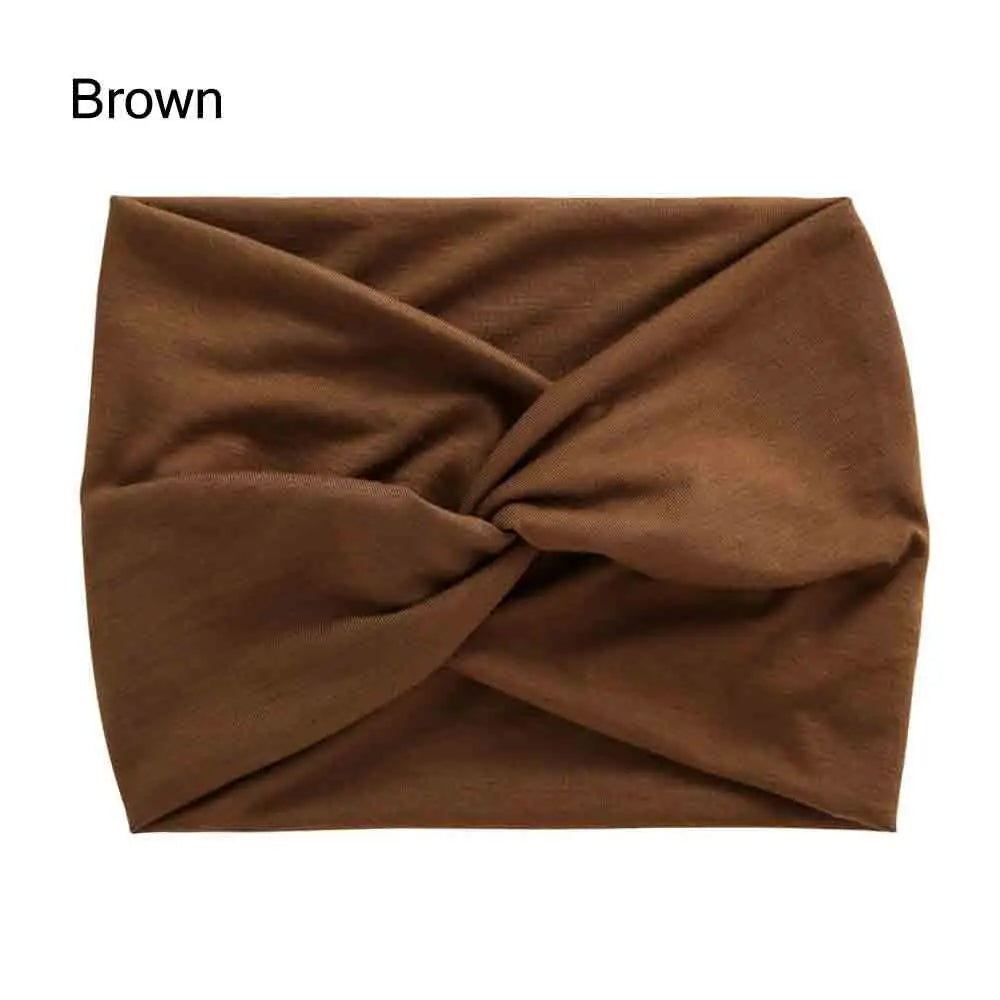 Brown headband with a knot on a white background