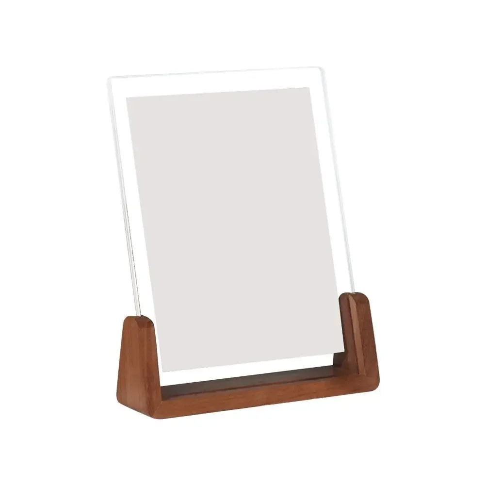 Wooden photo stand with a clear acrylic panel on a white background