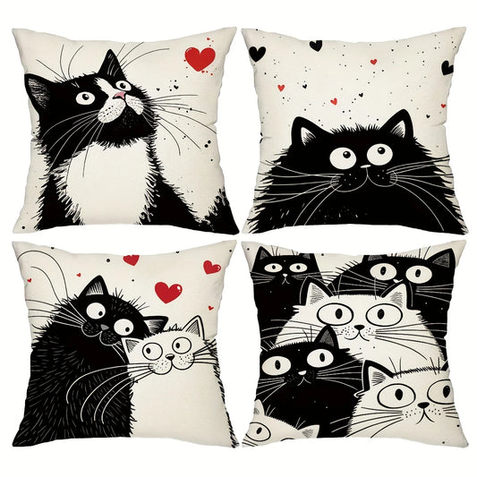 Set of four decorative pillows with black and white cat illustrations on a white background.
