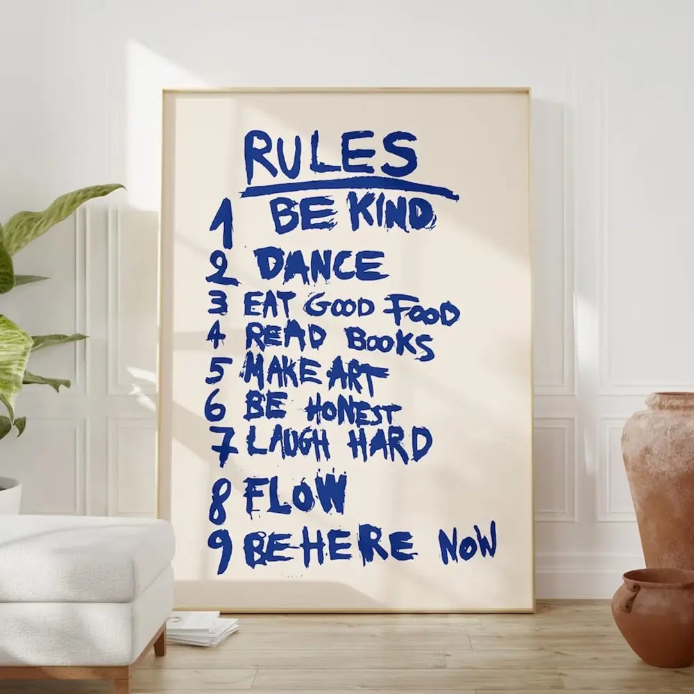 Framed poster with motivational rules in a room setting