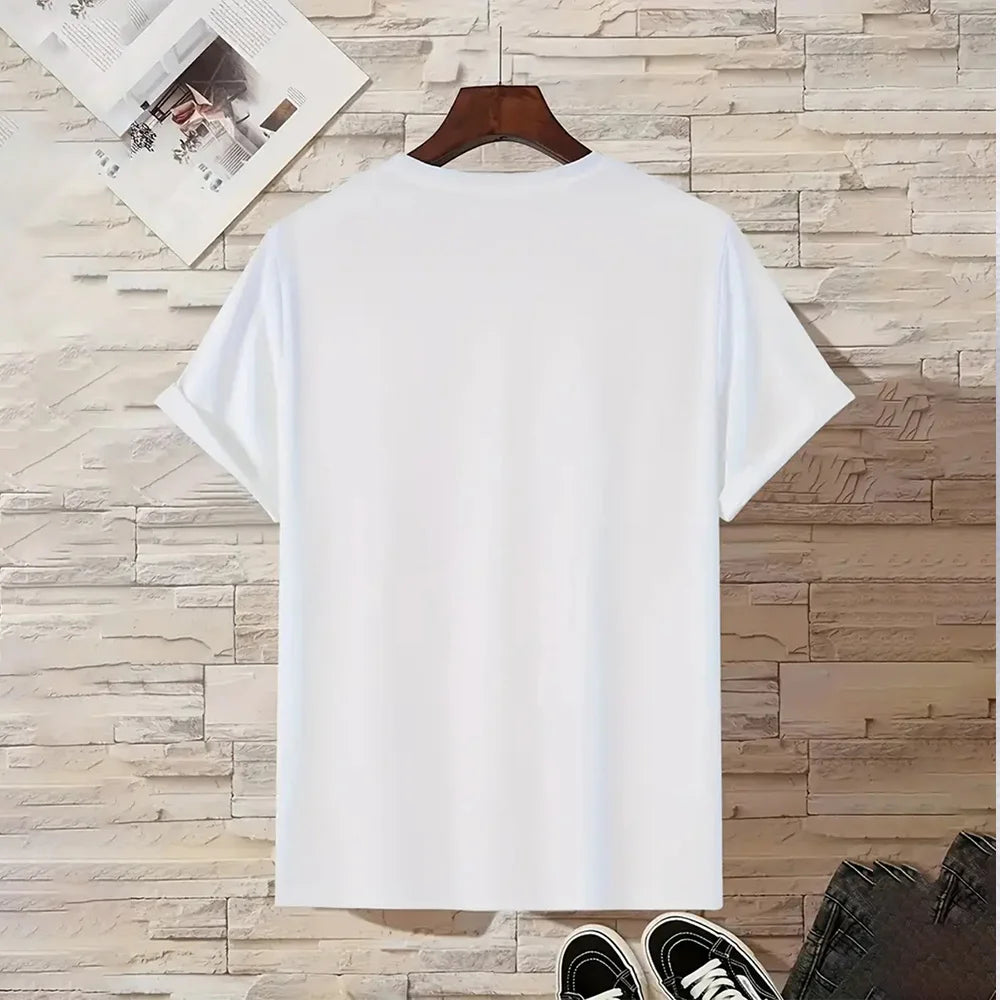 White t-shirt on a wooden hanger against a wooden paneled wall.
