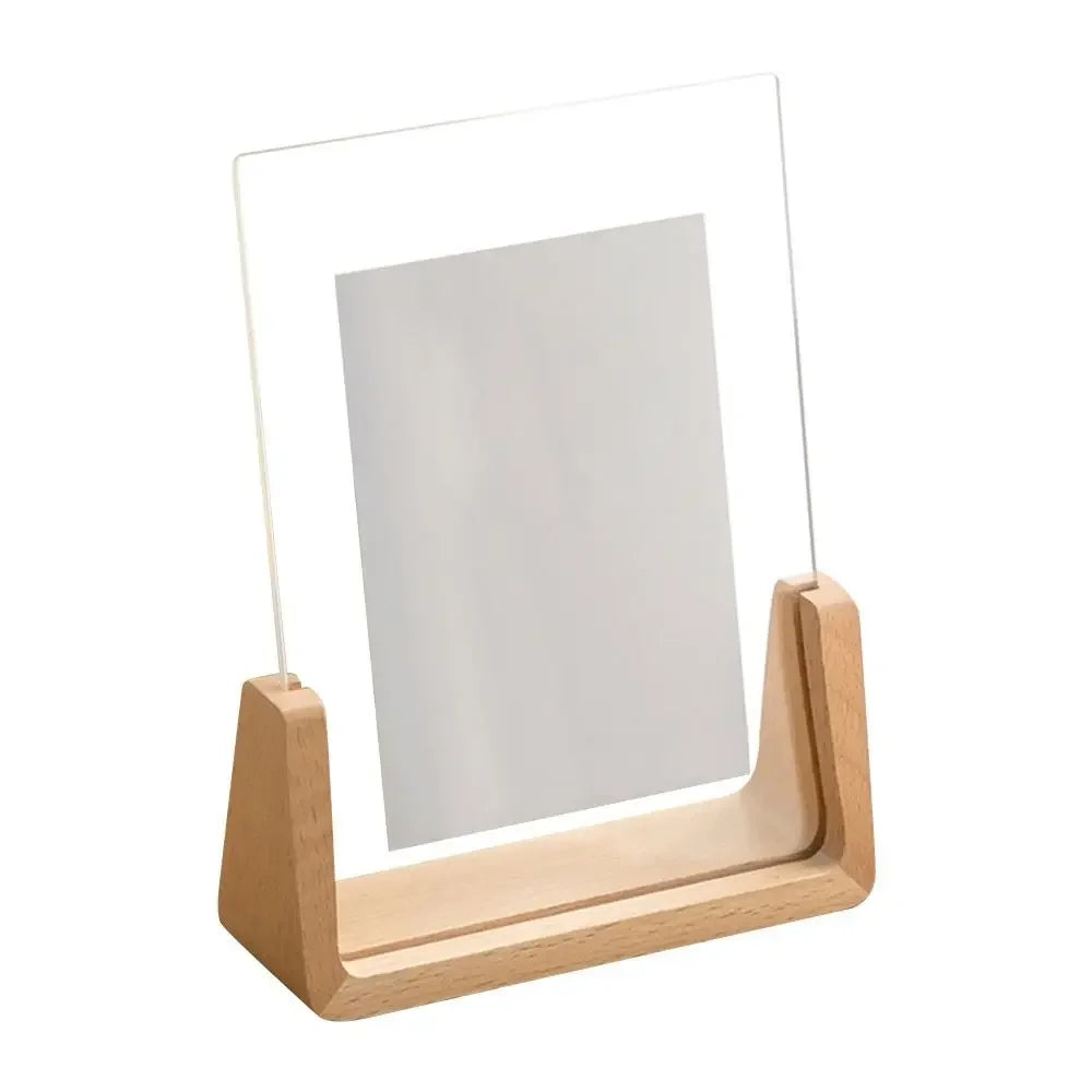 Small photo frame with wooden frame on a white background