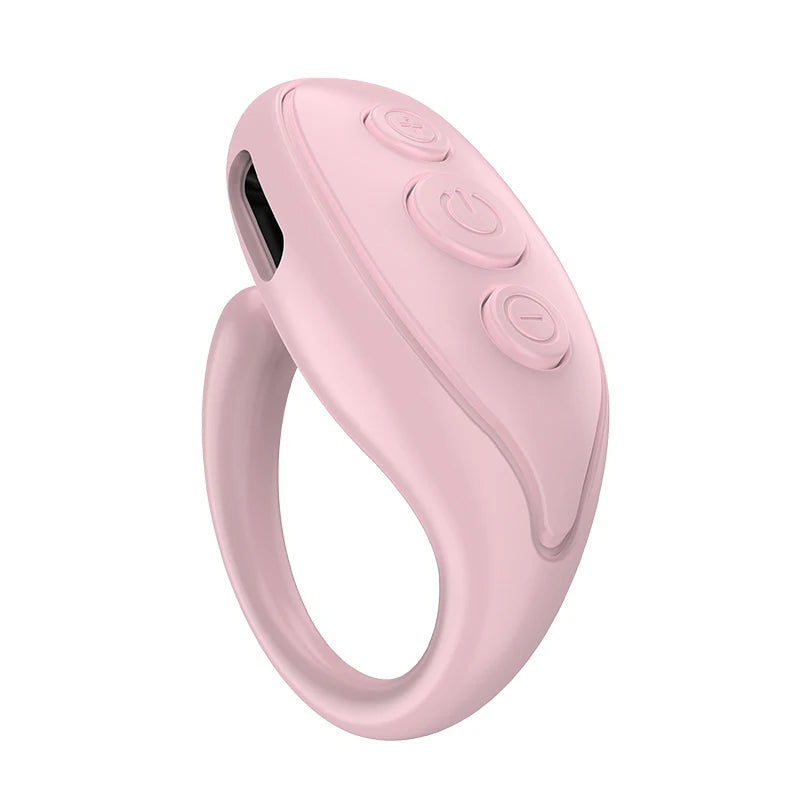 Pink electronic ring with buttons on a white background