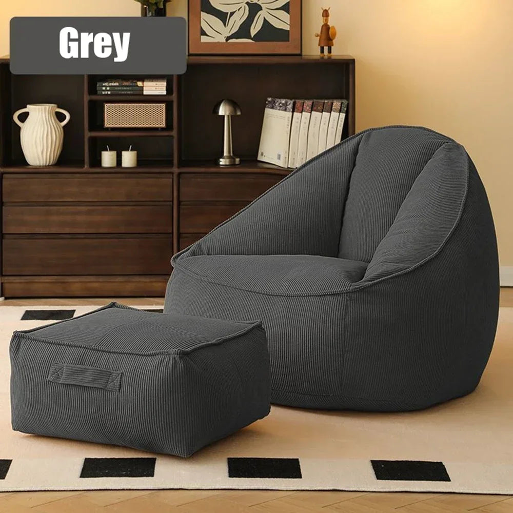 Gray bean bag chair with ottoman in a room setting
