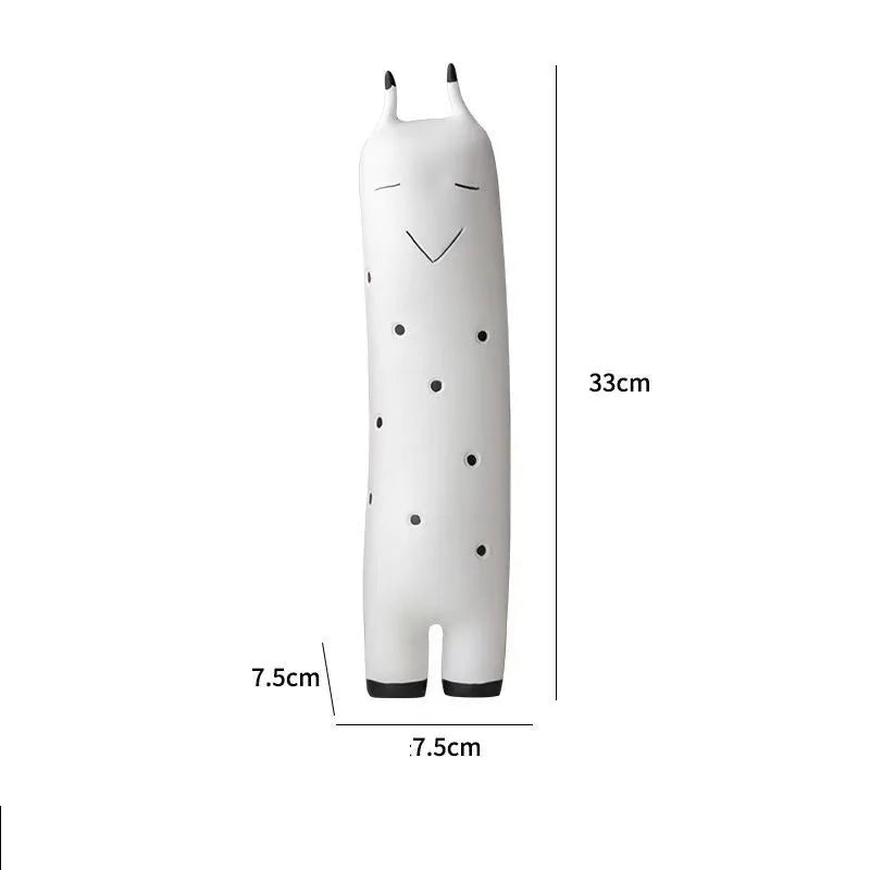 White apron with black polka dots and measurements on a white background