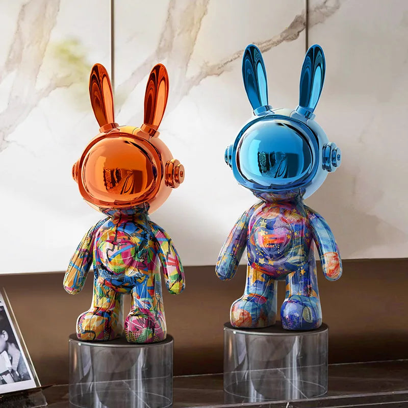 Modern graffiti-style rabbit and bear resin statues in colourful collectible art designs