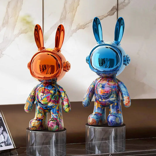 Modern graffiti-style rabbit and bear resin statues in colourful collectible art designs