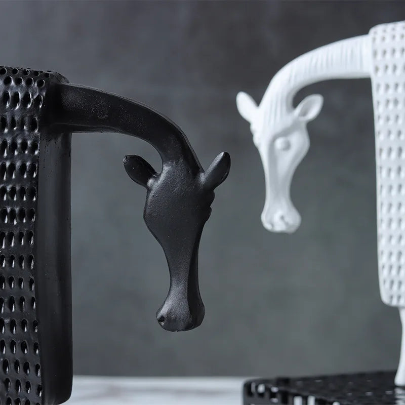 Abstract armoured horse sculpture in black and white resin with textured decorative armour, modern contemporary ornament for home decor.
