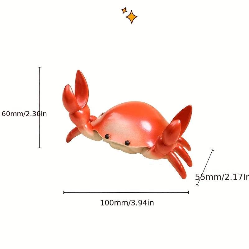 Red crab toy with measurements on a white background
