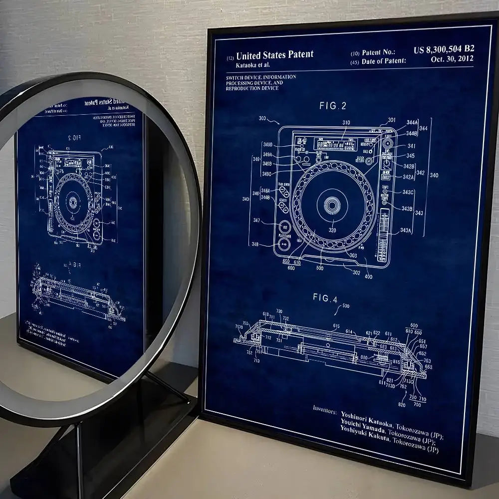 Framed patent blueprint of a device on a surface with a magnifying glass.