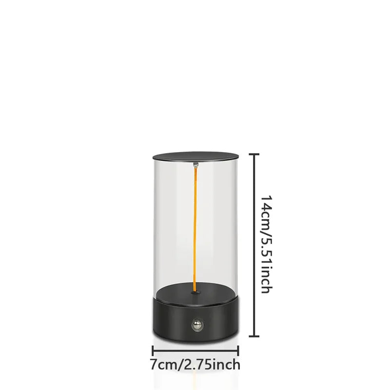 Black cylindrical lamp with dimensions indicated on a white background