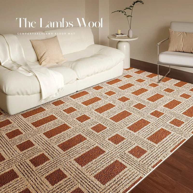 Patterned rug with brown and beige design in a living room setting.