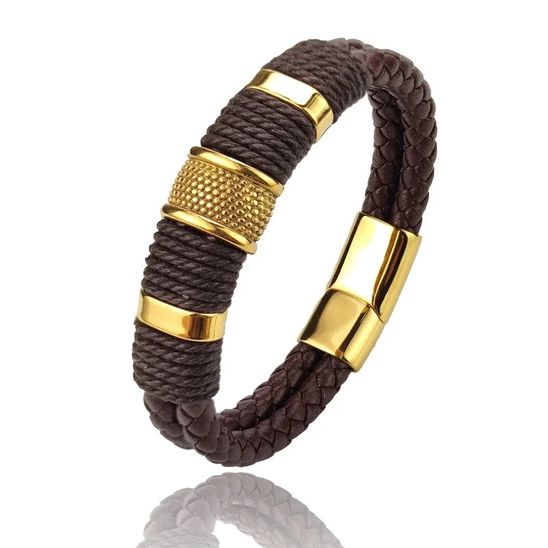 Brown braided bracelet with gold accents on a white background