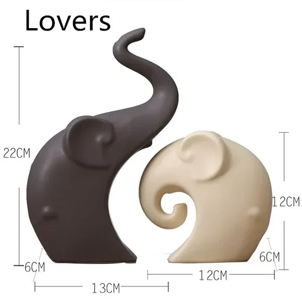 Two elephant-shaped objects, one brown and one beige, with measurements on a white background.