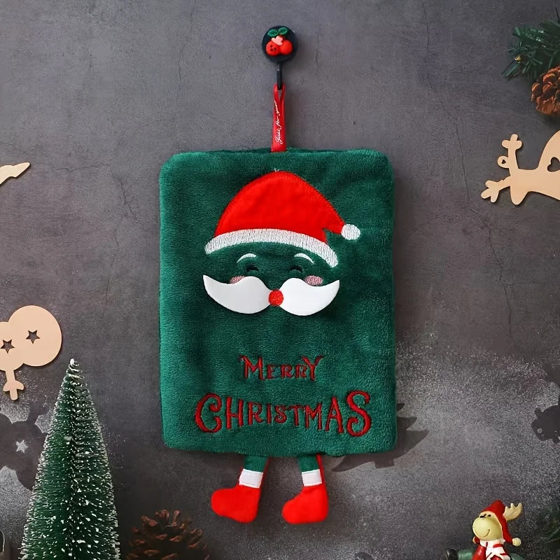 Green Christmas decoration hand towel with a Santa Claus face and 'Merry Christmas' text on a dark background
