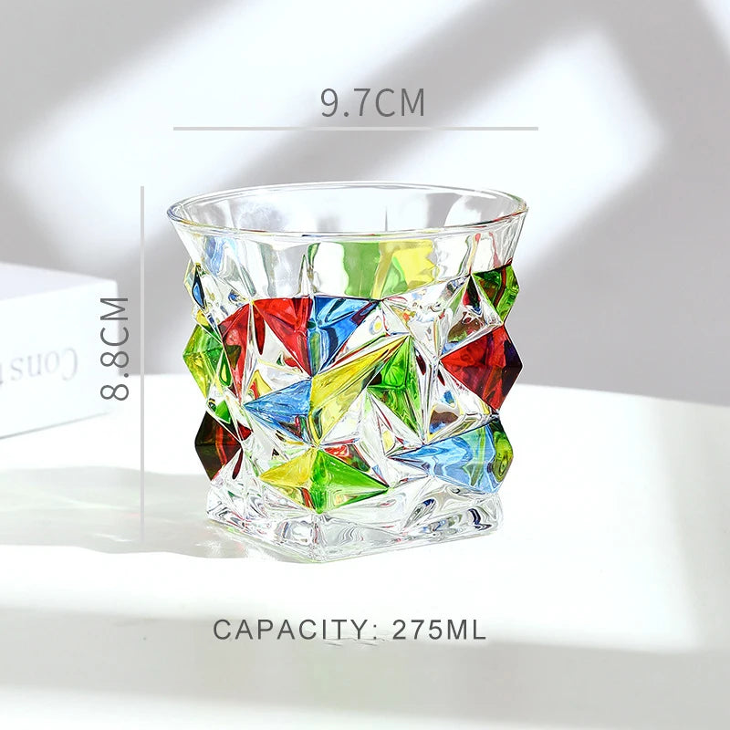 Colorful geometric-patterned glass with measurements and capacity details on a white background