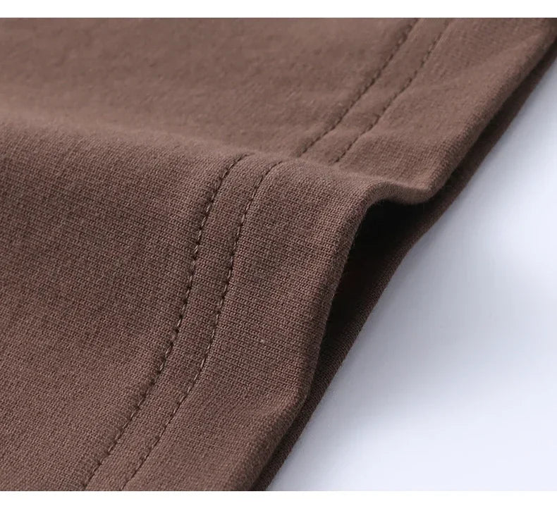 Close-up of brown fabric with a white background