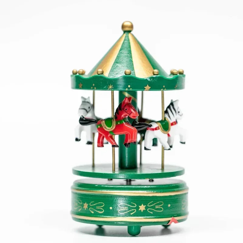 Green carousel toy with horses on a white background
