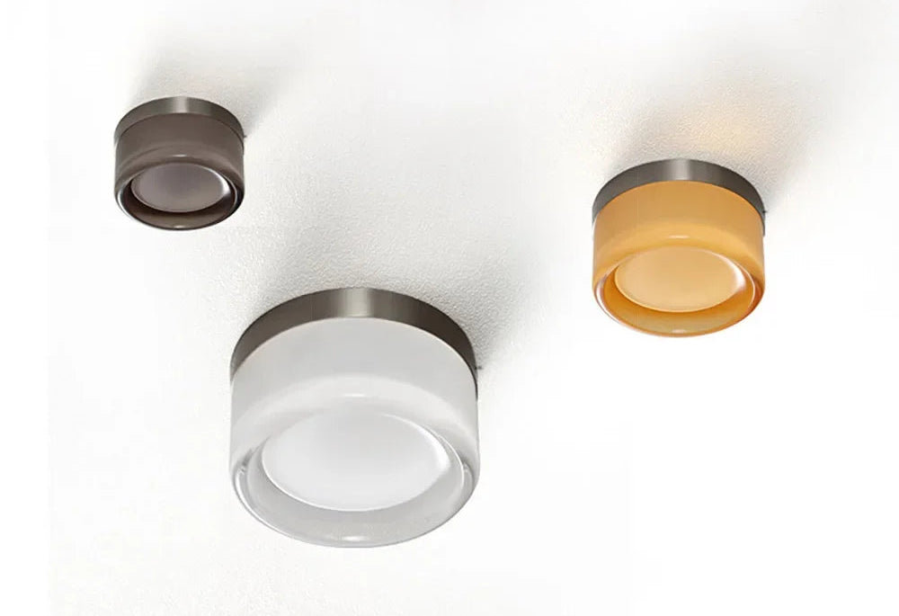 Three ceiling lights on a white background with text about rainproofing.