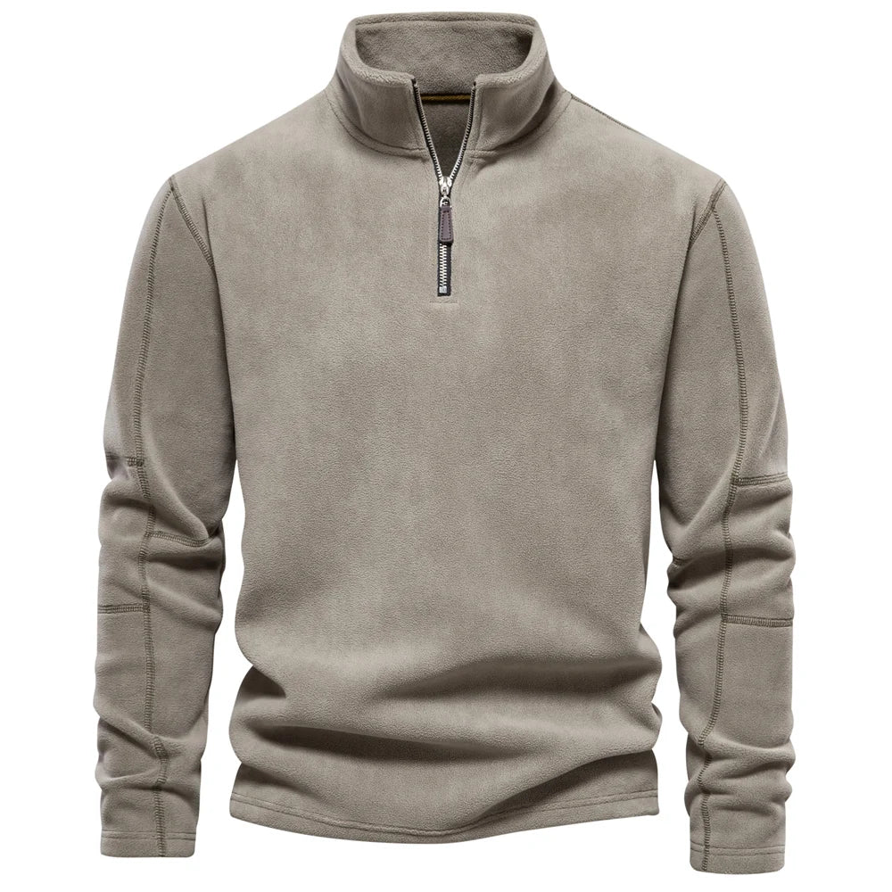Beige fleece pullover with a zipper on a white background