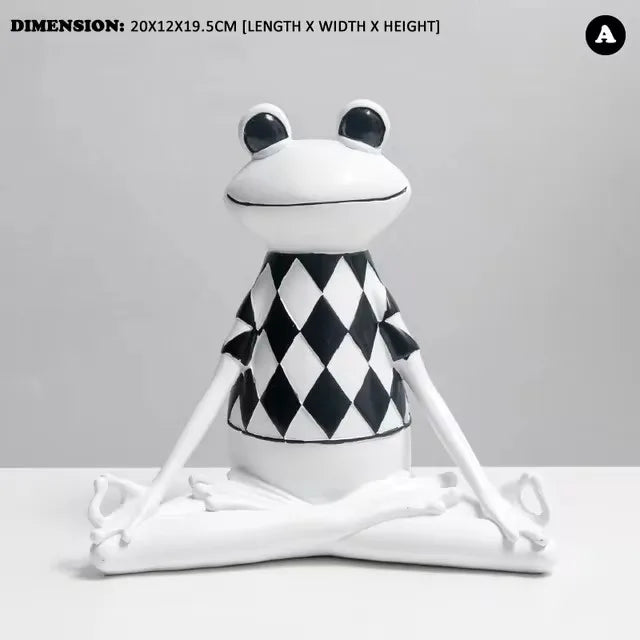 White frog figurine with black and white checkered pattern on a gray background