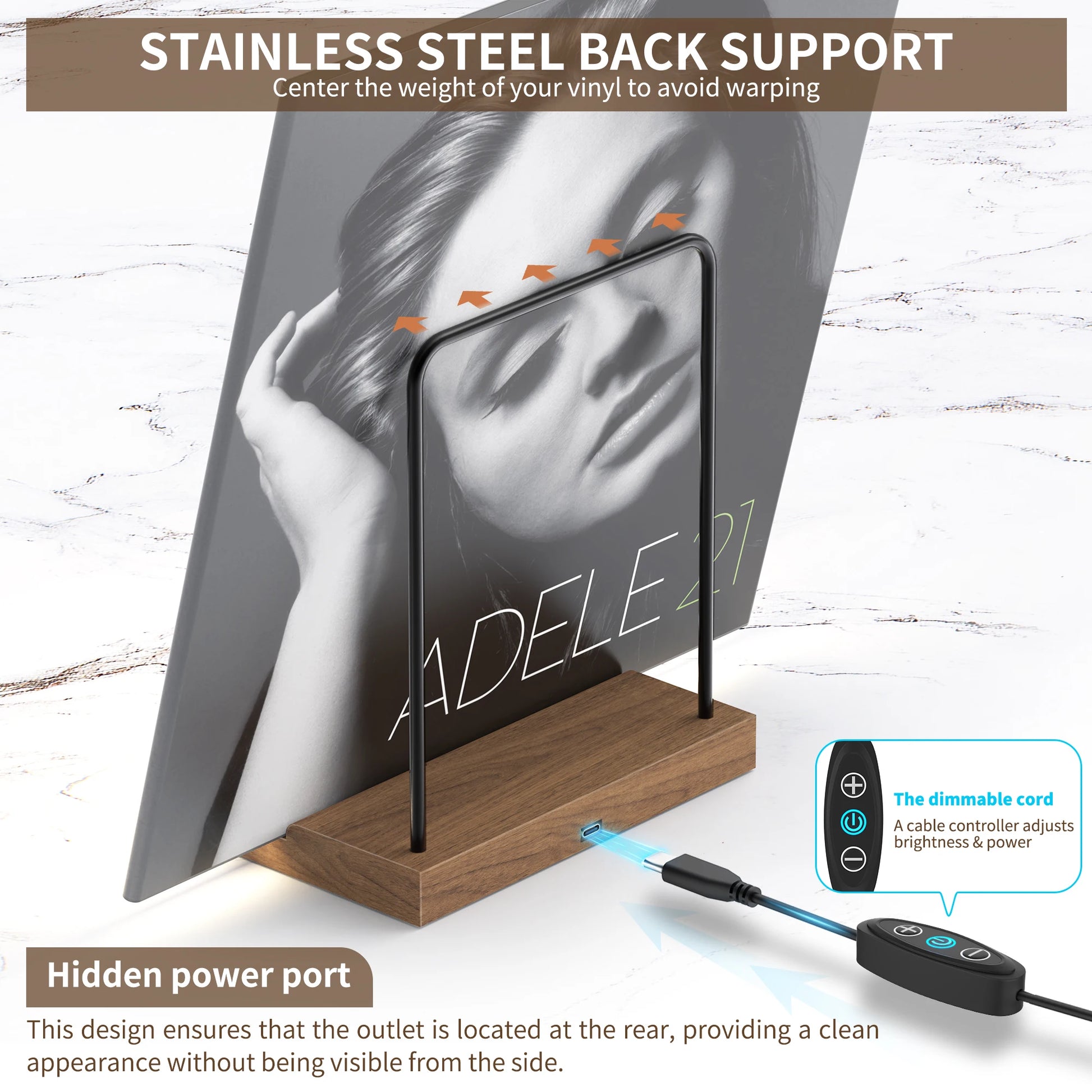 Music album with a stand and power cable on a light wooden surface