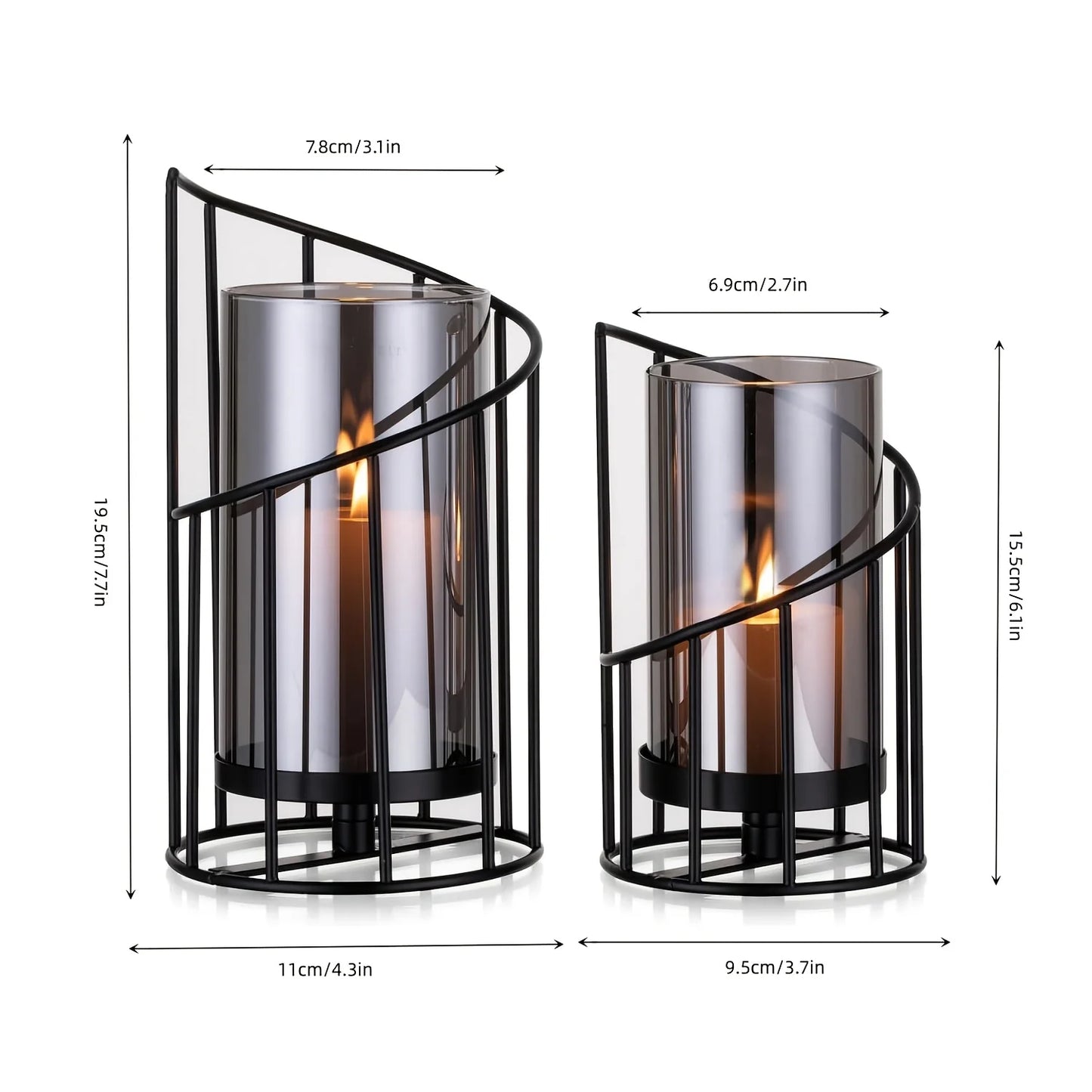 Set of two modern black spiral glass candle holders with smoked hurricane glass displayed on a wooden table in a contemporary home interior.