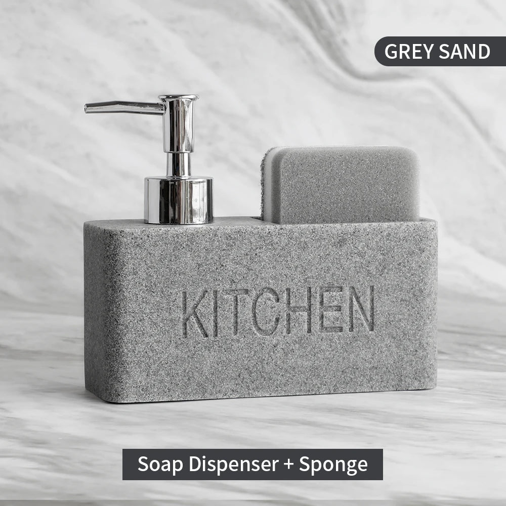 Soap dispenser and sponge set with 'KITCHEN' text on a gray sand background