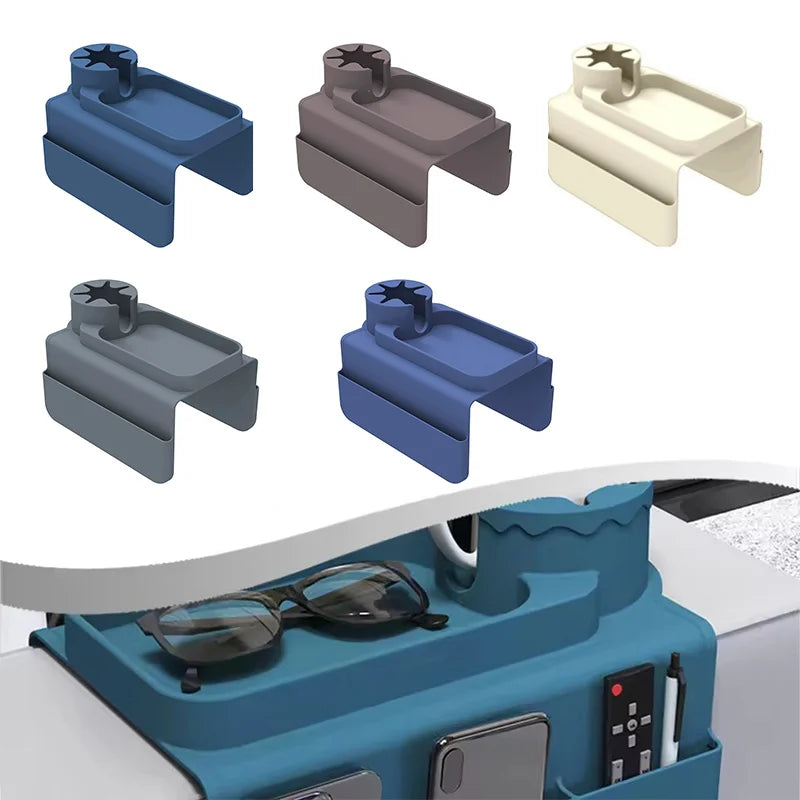 Silicone sofa armrest cup holder holding a mug, remote controls and smartphones . Showing the colours available.