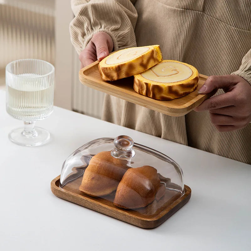 Glass pastry display dome with bamboo serving base