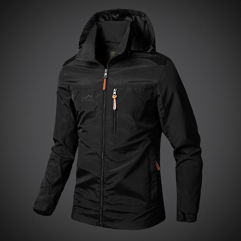 Black jacket with orange zippers on a gray background