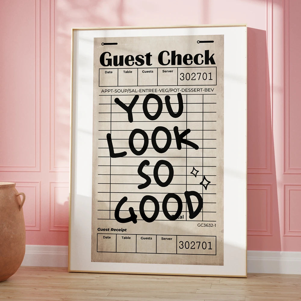 Framed poster with 'You Look So Good' text on a pink wall background