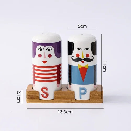 Creative ceramic salt and pepper shaker set with character faces displayed on a wooden holder for stylish kitchen and dining table decor. with dimensions
