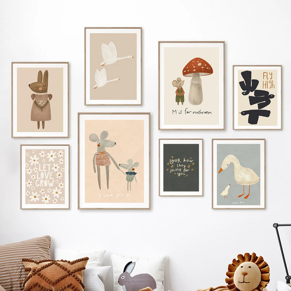 Collection of framed illustrations on a wall with a cozy living room setting.