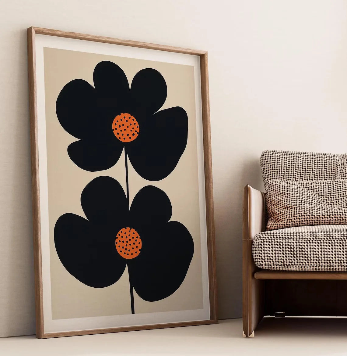 Mid-century modern black floral canvas art print with orange polka-dot centres in minimalist Scandinavian style