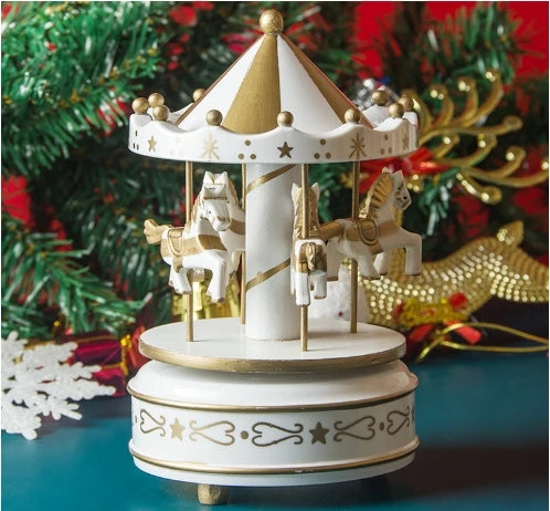Decorative carousel with horses on a stand against a festive background