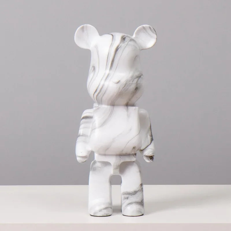 Marble-patterned figurine on a gray background