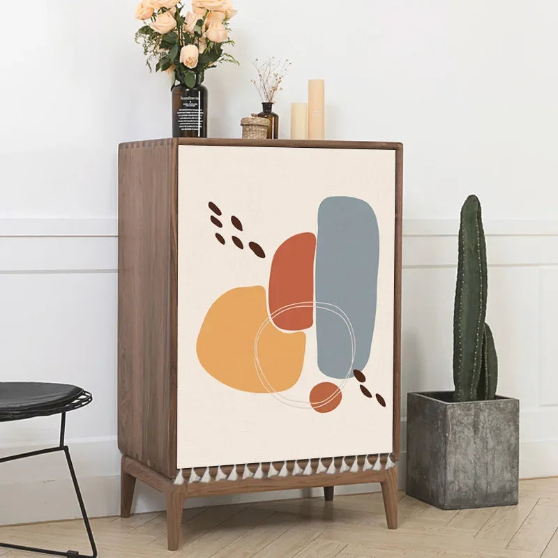 Multiple boho-style self-adhesive cabinet door curtains with abstract sun, moon, rainbow and geometric patterns on wooden cupboards