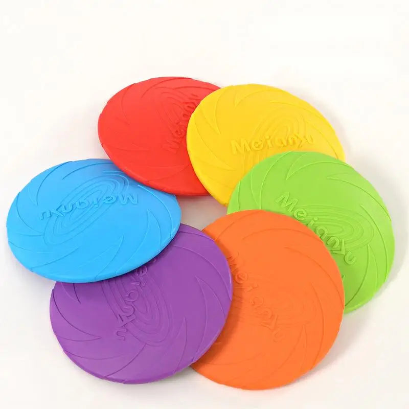 Set of colorful dog frisbees on a white background