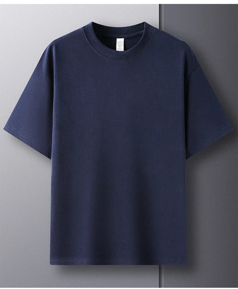 Navy blue t-shirt on a gray background