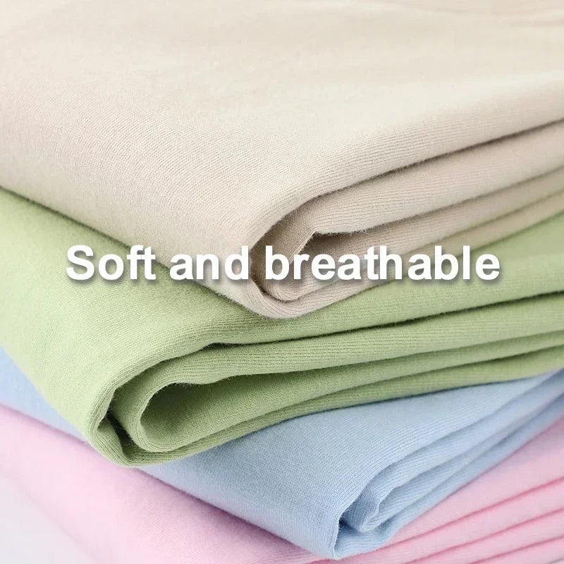 Stack of soft fabric swatches in pastel colors with text 'Soft and breathable'.