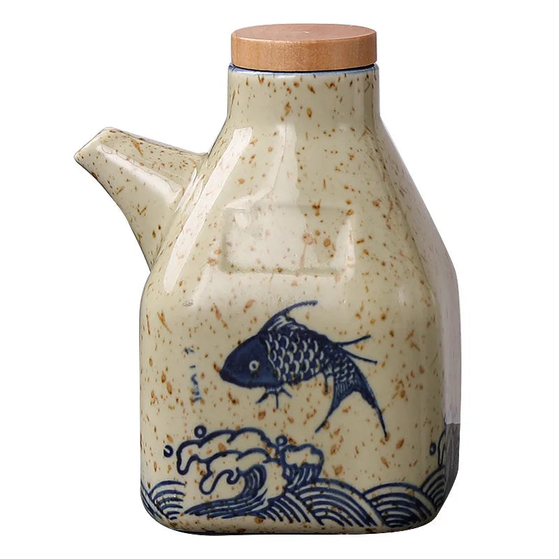 Ceramic container with fish design on a white background